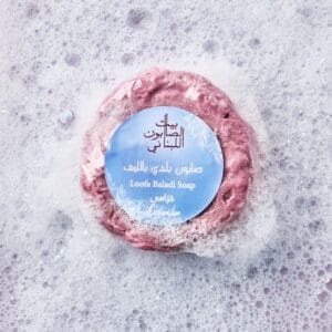 Naturally luxurious, fragrant and handmade skincare Lavender Loofah Baladi Soap by House of Soap foaming lathering in water