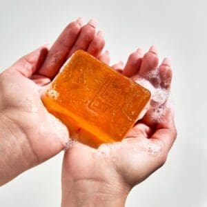 Naturally luxurious, fragrant and handmade skincare Glycerin Soap by House of Soap lathering in hands